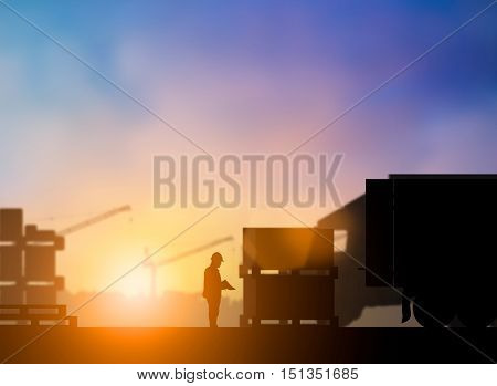 Silhouette of high voltage equipment engineer check before boarding a shuttle to dock to construction site over blurred pastel background sunset shipping. Heavy industry and Transportation concept.