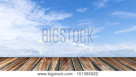 empty wood floor with blue sky background. summer relaxing time.
