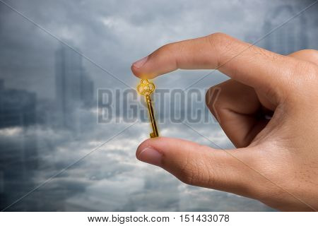 business hand with business key. concept unlock business success.