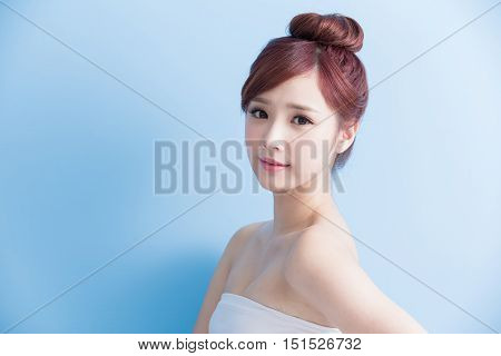 beauty woman smile to you isolated on bluebackground asian