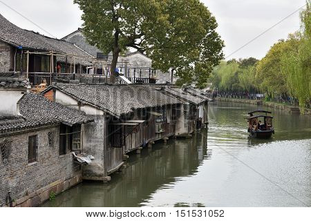WUZHEN CHINA - MARCH 24: Old Town of Wuzhen on March 24 2016 in Wuzhen China. Wuzhen is a historic scenic town located in northern Zhejiang Province China