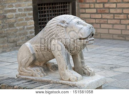 Statue of a lion in asian style, Uzbekistan