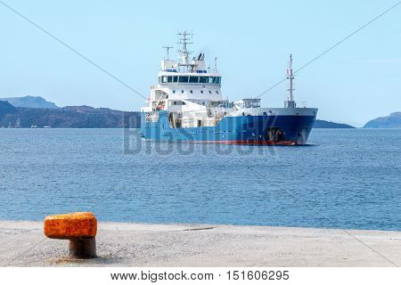 Small tanker on the raid of the island Santorini. Greece.