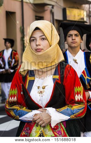 SELARGIUS, ITALY - September 11, 2016: Former marriage Selargino - Sardinia - portrait of a beautiful girl in traditional Sardinian costume