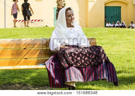 SELARGIUS, ITALY - September 11, 2016: Former marriage Selargino - Sardinia - portrait of a beautiful girl in traditional Sardinian costume