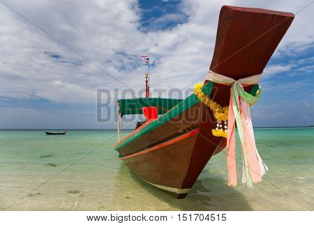 A Long Tail Boat on Haad Salat Beach in Koh Pangan Thailand