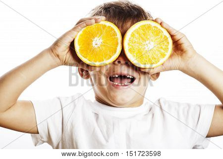 little cute boy with orange fruit double isolated on white smiling without front teeth adorable kid cheerful close up