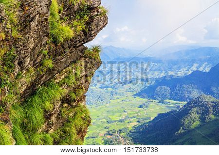Cliffs Of Stone With Green Grass