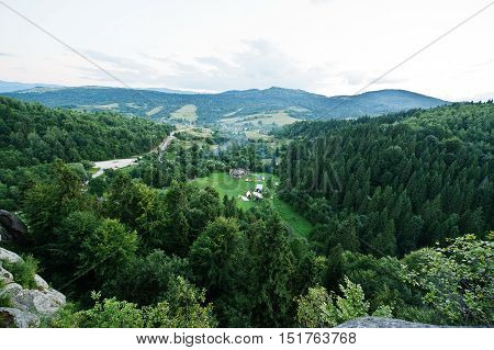 Tustan Fortress Ruins Of Rocks At Carpathian Ukraine. View On Camping Village