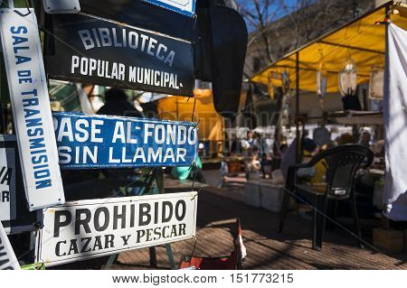 Detail of old signs in a stall in the market of San Telmo in Buenos Aires Argentina