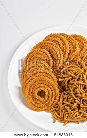 Indian Snack : Besan (Gram flour) Sev and chakli, chakali or Murukku. Diwali Food