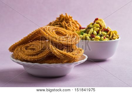 Indian Snack : Chakli, chakali or Murukku and Besan (Gram flour) Sev and chivada or chiwada. Diwali Food