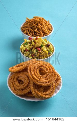 Indian Snack : Chakli, chakali or Murukku and Besan (Gram flour) Sev and chivada or chiwada. Diwali Food