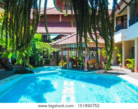 Kuta Bali Indonesia - April 09 2012: View of swimming pool at The Flora Kuta Bali