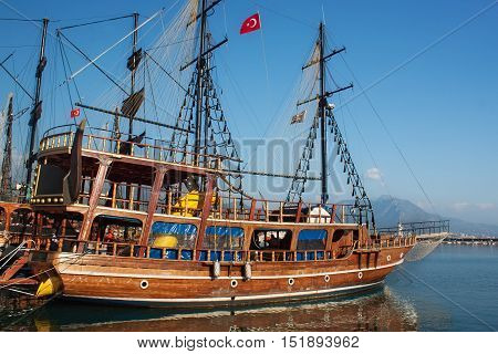Small wooden pirate sailing ship for marine tourist trips along the coast of Alanya. Boat tours is a very popular form of recreation in the Mediterranean.