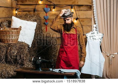 Handsome Tailor Man In Workshop