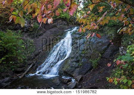 Jacobs Falls In Keweenaw County Michigan. Jacobs Falls framed by fall foliage in the Upper Peninsula of Michigan.
