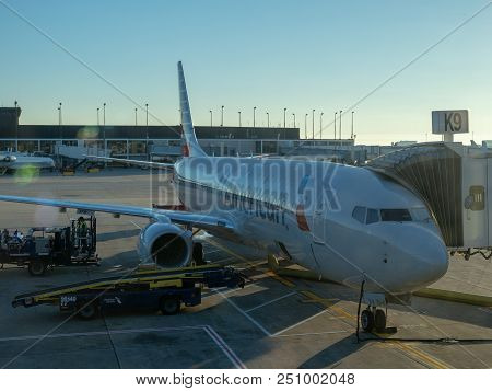 San Francisco, Ca July 2, 2018: Passengers Disembark Off An American Airlines Airplane Docked At San