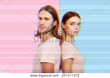 Back To Back. Young Couple Standing Back To Back And Looking Serious After Having A Quarrel