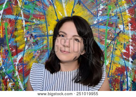 Beautiful Girl With Dark Hair And Different Eye Color Heterochromia . Smiles At The Photos In The Pa