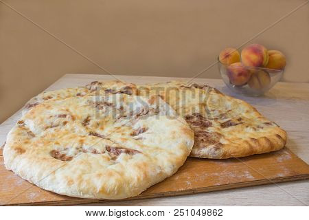 Close-up Georgian Lobiani Or Traditional Flatbread With Red Beans Stuffing. Favorite Food Concept
