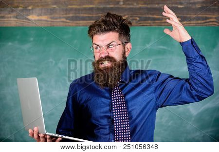 Can Not Get Used To Modern Technology. Teacher Bearded Man With Modern Laptop Chalkboard Background.