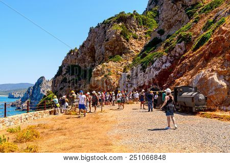 Buggerru, Sardinia, Italy - July 27, 2018: Every Year, Thousands Of Tourists From All Over The Count