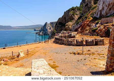 Buggerru, Sardinia, Italy - July 27, 2018: Every Year, Thousands Of Tourists From All Over The Count