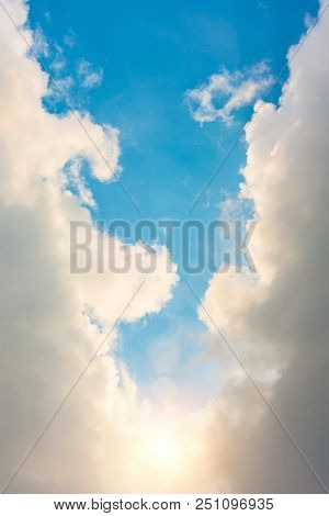 Divine Light From The Sun In A Clear Cloud And Blue Sky