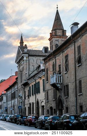 Ferrara, Italy - July, 23, 2018: cars parked in Ferrara, Italy, in evening