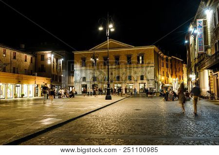 Ferrara, Italy - July, 23, 2018: street in the historical center of Ferrara at a night