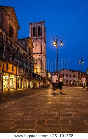 Ferrara, Italy - July, 23, 2018: street in the historical center of Ferrara at a night