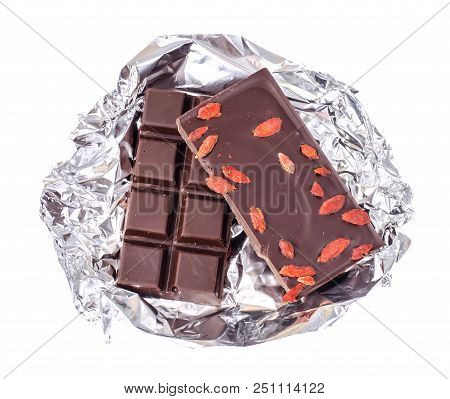 Black Bitter Chocolate With Goji Berries. Studio Photo