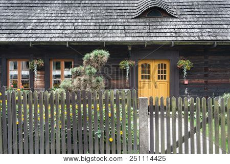 An Antique Wooden Cottage With A Log Construction Without Remnants From 1831. Village Kielcza, Opole