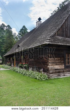An Antique Wooden Cottage With A Log Construction Without Remnants From 1831. Village Kielcza, Opole