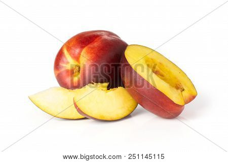 Group Of One Whole One Half Two Slices Of Ripe Deep Red Nectarine Isolated On White