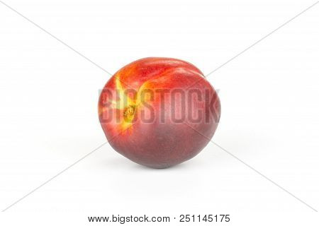 One Whole Ripe Deep Red Nectarine Isolated On White