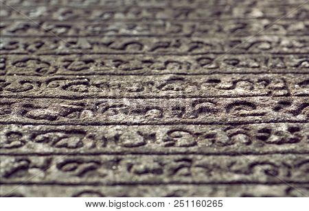 Manuscript On Stone. Sinhalese Language On 12th Century Wall Of Hindu Temple. Polonnaruwa, Sri Lanka