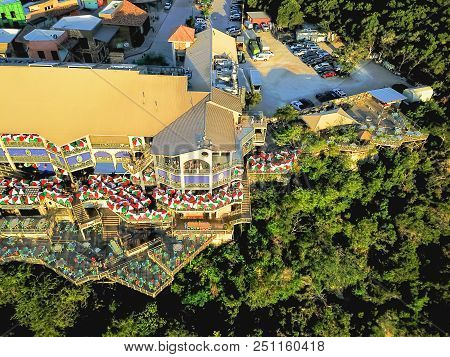 Top View Colorful Restaurant Near Cliff Rock Wall In Austin, Texas, Usa