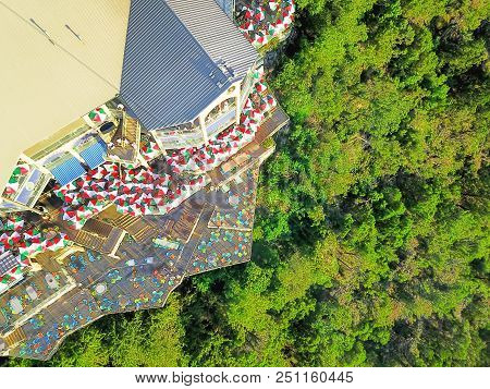 Top View Colorful Restaurant Near Cliff Rock Wall In Austin, Texas, Usa