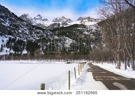 Panticosa snow frozen lake ice in Huesca Pyrenees of Spain