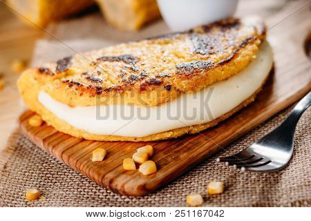 Cachapa With Cheese, Typical Venezuelan Dish Made With Corn, Cheese And Butter