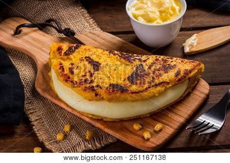 Cachapa With Cheese, Typical Venezuelan Dish Made With Corn, Cheese And Butter