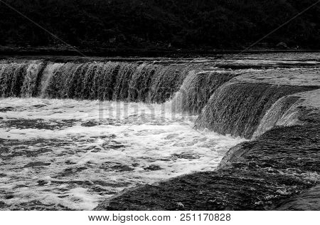 Small Waterfall On Tosna River In Leningrad Region, Russia. Black And White.