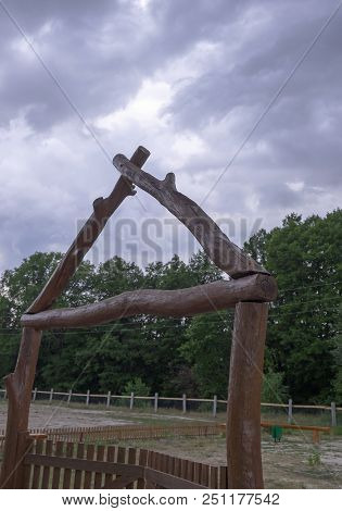 Wooden Gate Against The Background Of The Evening Sky
