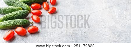 Fresh Tomatoes, Cucumbers And Green Onions On Light Background. Horizontal Photo Banner For Website 