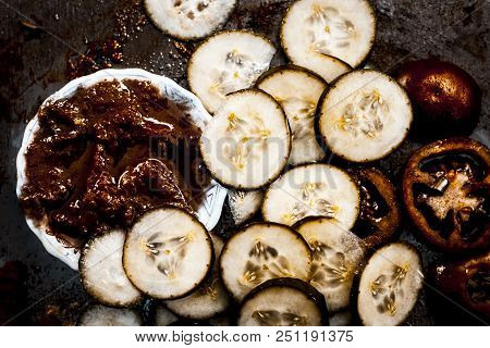 Close Up Of Ingredients An Face Pack Of Raw Fresh Vegetables  On Gothic Surface I.e. Tomato Puree An