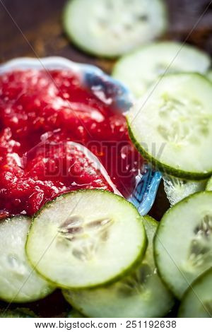 Close Up Of Ingredients An Face Pack Of Raw Fresh Vegetables  On Gothic Surface I.e. Tomato Puree An
