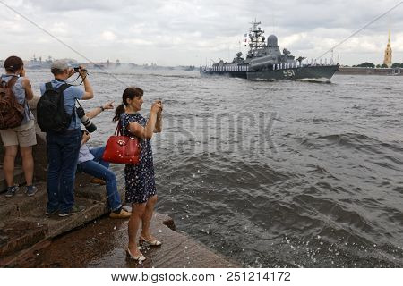 ST. PETERSBURG, RUSSIA - JULY 26, 2018: People make photo of the rehearsal of the Navy Day parade with Nanuchka class corvette Liven. Navy Day is celebrated in last Sunday of July