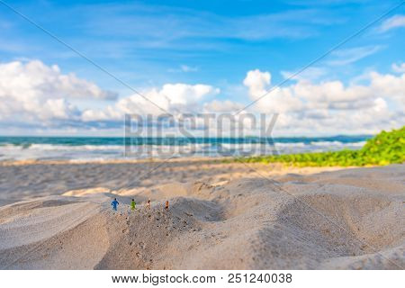 Image Of Two Runner On Sand Beach.